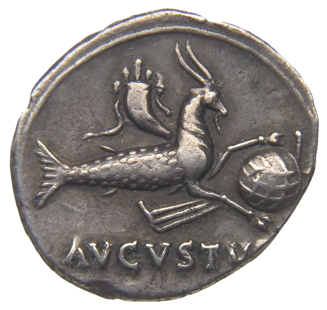 Augustus reverse — Capricorn right, holding globe with attached rudder, cornucopia above