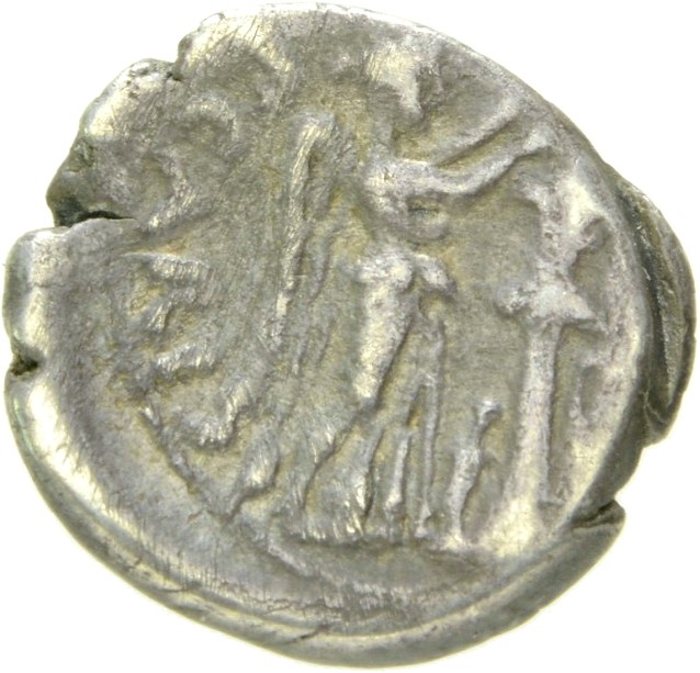 RIC I (second edition) Augustus 1B Augustus reverse, Victory standing right, placing wreath on trophy with dagger and swor...