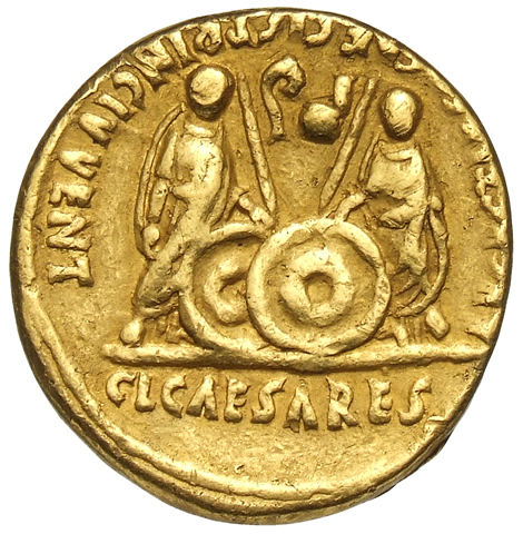 Augustus reverse — Gaius and Lucius Caesar standing, each, togate, resting hand on shield and spear, simpulum, left, and lituus, right, flanking, right and left respectively