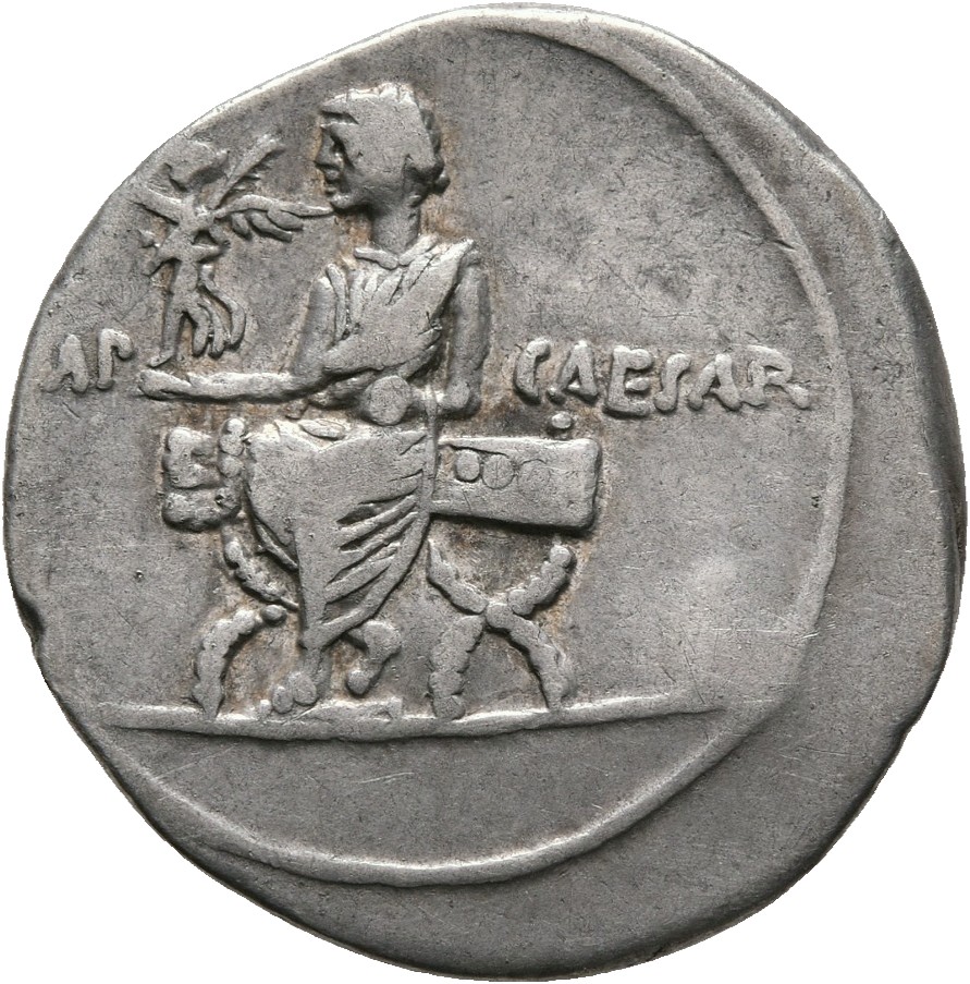 RIC I (second edition) Augustus 270 Augustus reverse — Octavian, togate, seated left, on curule chair, holding Victoriola ...