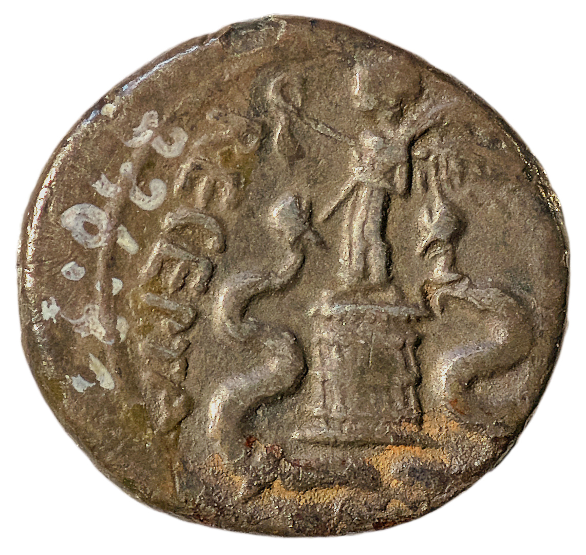 Augustus reverse — Victory, draped, standing left, holding wreath in right hand and palm in left, on cista mystica between two snakes