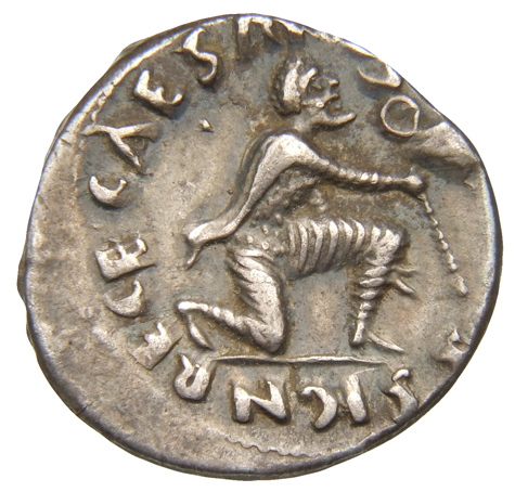 Augustus reverse — Parthian kneeling right, extending standard with X-marked vexillum with right hand and holding out left hand