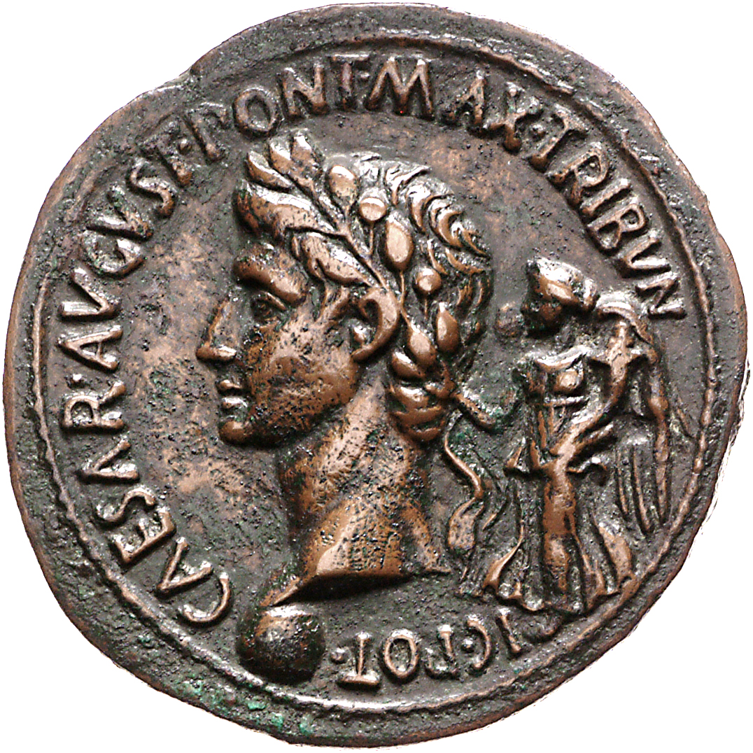 Augustus obverse — Head of Augustus, laureate, left, crowned by Victory standing, left, carrying cornucopia; globe at point of neck