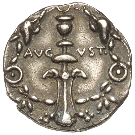 Augustus reverse — Candelabrum ornamented with rams' heads and surmounted by crescent, within wreath entwined with bucrania and paterae