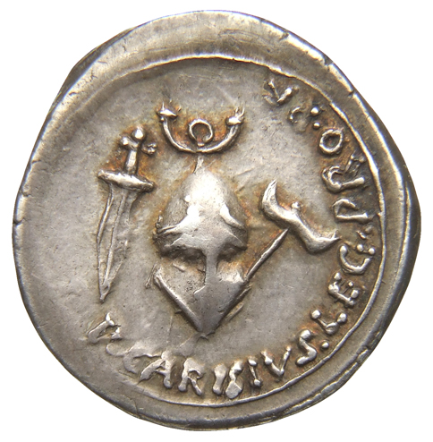 Augustus reverse — Helmet with stag horns between dagger and bipennis