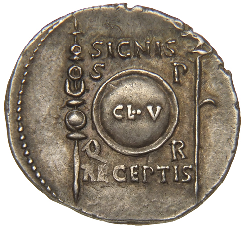 Augustus reverse — Round shield inscribed CL V, with S P Q R in corners between aquila, right, and standard, left