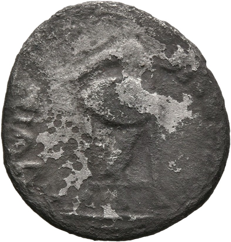 RIC I (second edition) Vitellius 86 Vitellius reverse, Tripod lebes on which lies a dolphin, beneath is a raven