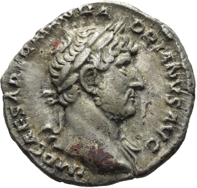 RIC II Hadrian 101a Hadrian obverse — Kopf des Hadrianus mit Lorbeerkranz und Gewandspuren an der l. Schulter nach r.