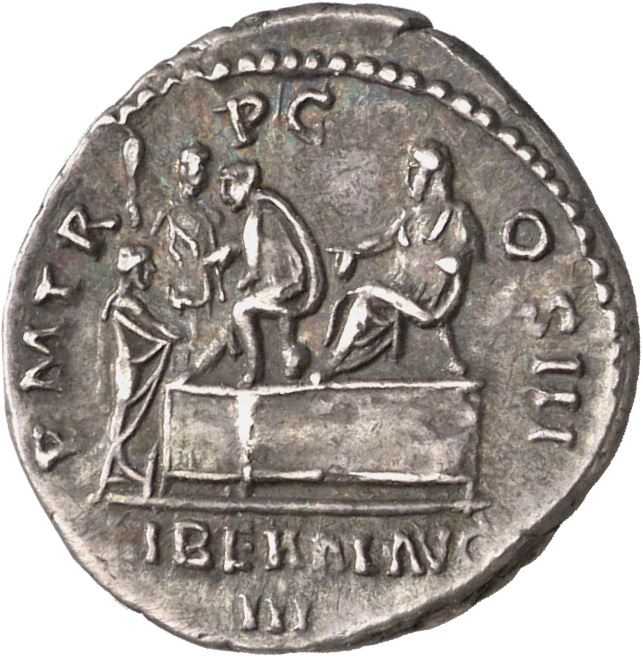 RIC II Hadrian 132a Hadrian reverse, Der Kaiser auf dem Tribunal, auf einem Stuhl (sella curulis) sitzend nach l., davor l...