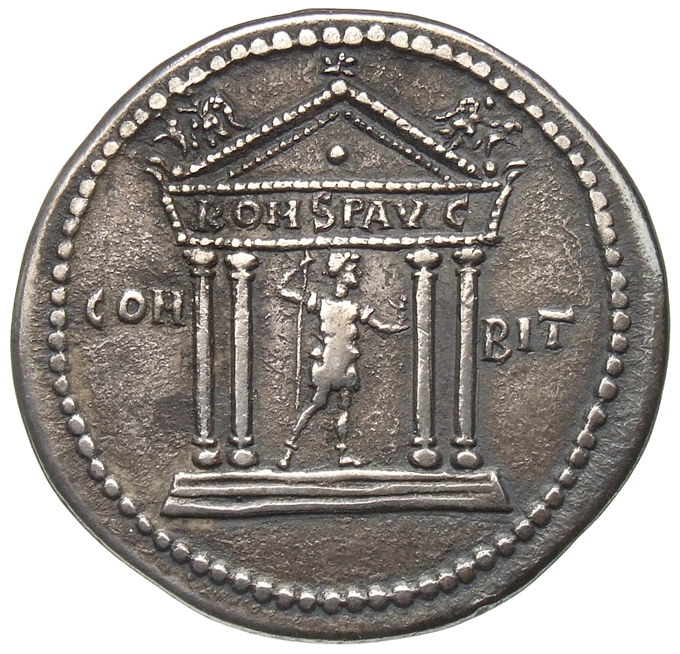 Hadrian reverse — Hadrianus steht in viersäuligem Tempel nach r., in der r. Hand Speer, in der ausgestreckten r. Hand Victoria. Auf dem Architrav ROM S P AVG.