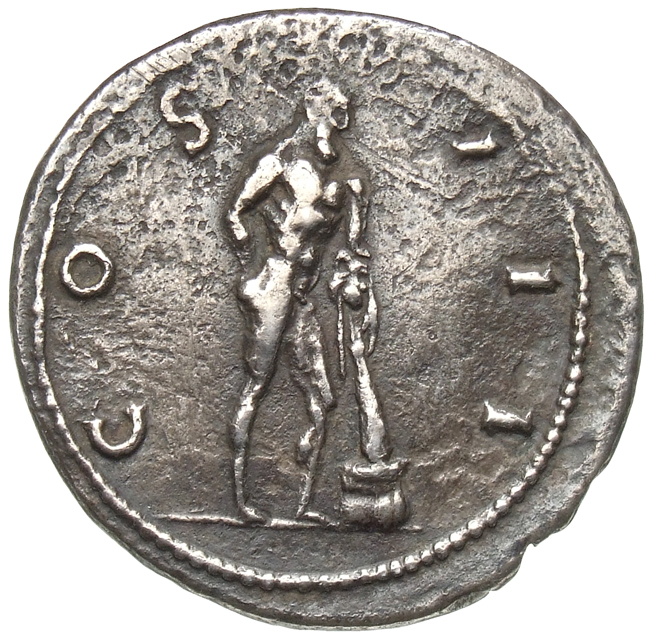 Hadrian reverse — Herakles steht nach r. Sein r. Arm ist angewinkelt auf den Rücken gelegt und mit seinem l. Arm stützt er sich auf seine Keule, über welcher das Löwenfell liegt und die auf einem Stein ruht.