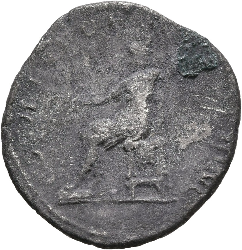 Trajan reverse — Roma, helmeted, in military dress, seated left, holding Victory on extended right hand and straight spear in left