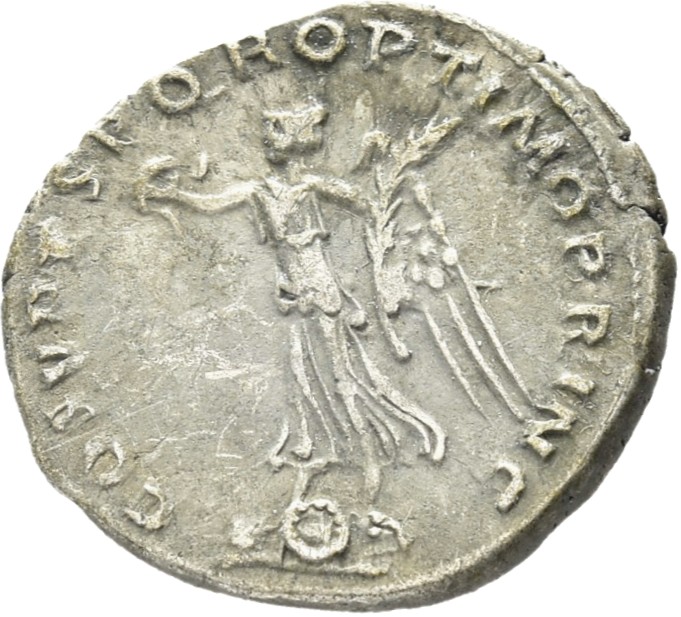 RIC II Trajan 129 Trajan reverse, Victory, draped, standing left over a round and oblong shield, holding up wreath in righ...