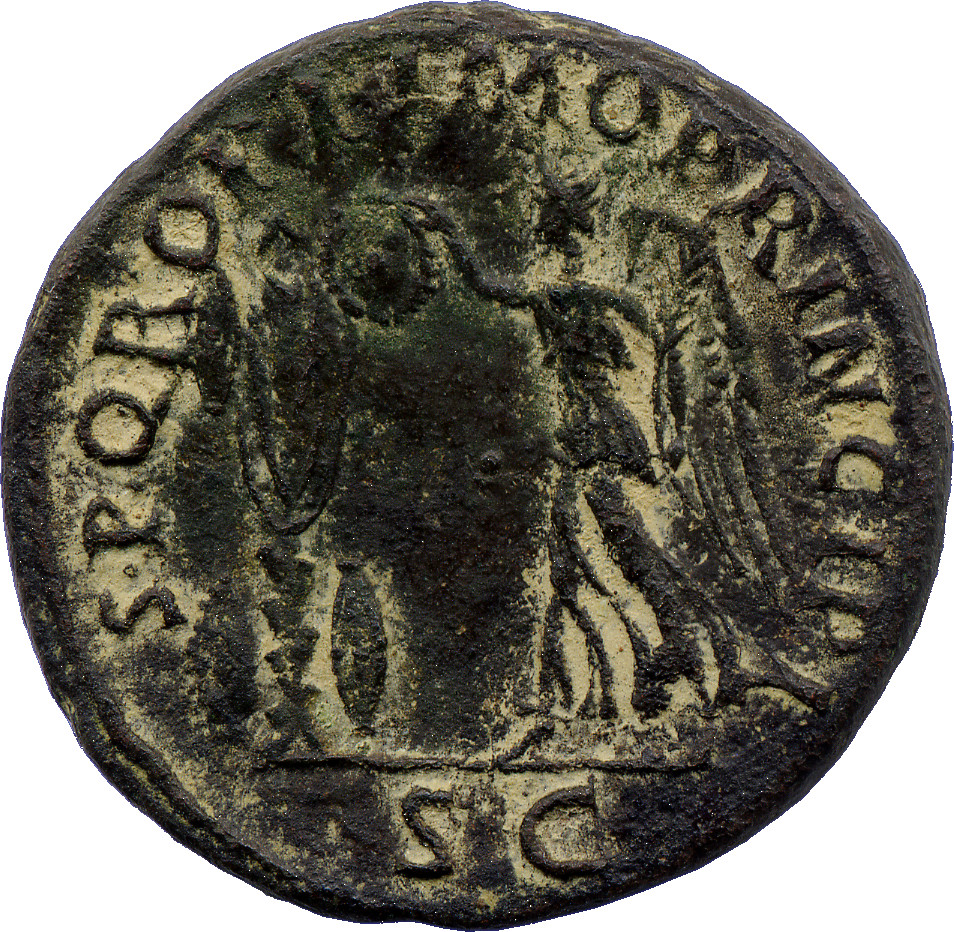 RIC II Trajan 524 Trajan reverse, Victory, draped, stepping left holding palm in left hand and with right hand setting a t...