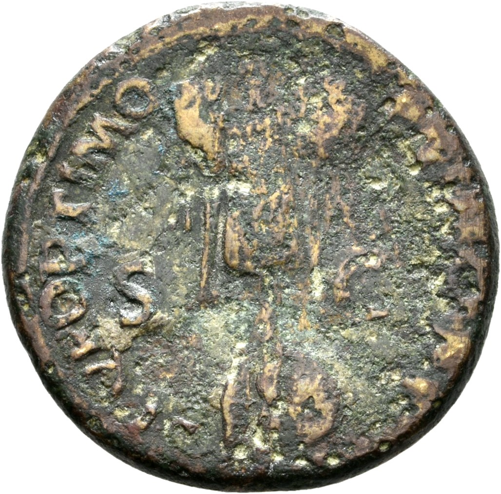 RIC II Trajan 586 Trajan reverse, Trophy consisting of helmet, cuirass, one round and one oblong shield; at base, one roun...