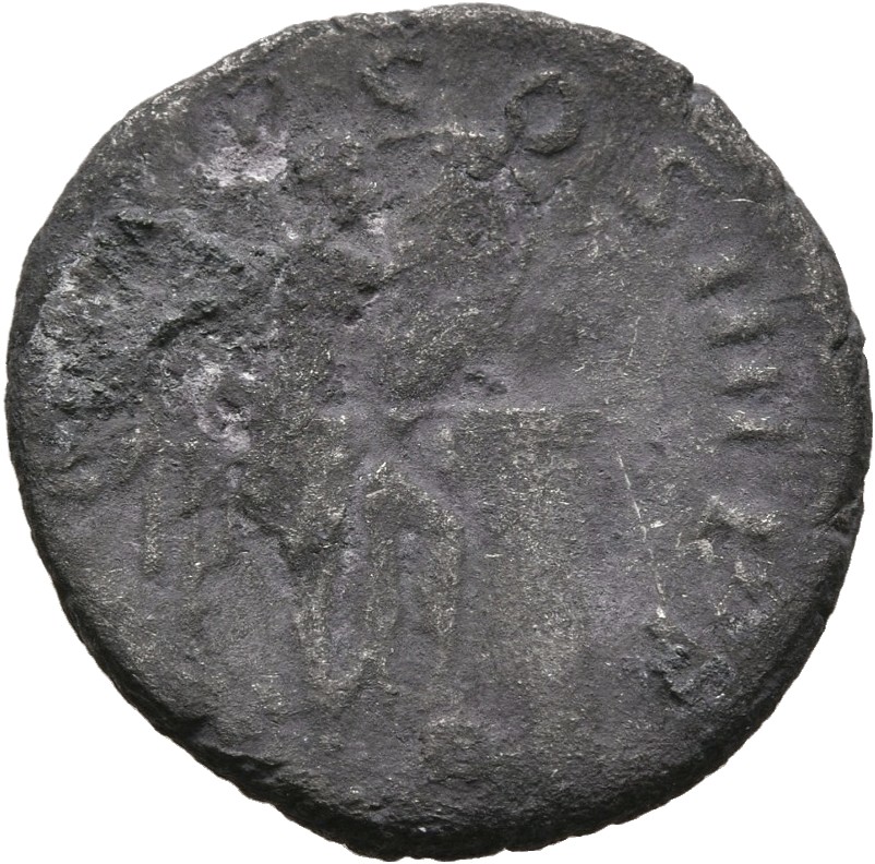 Trajan reverse — Victory seated right on cippus, inscribing shield