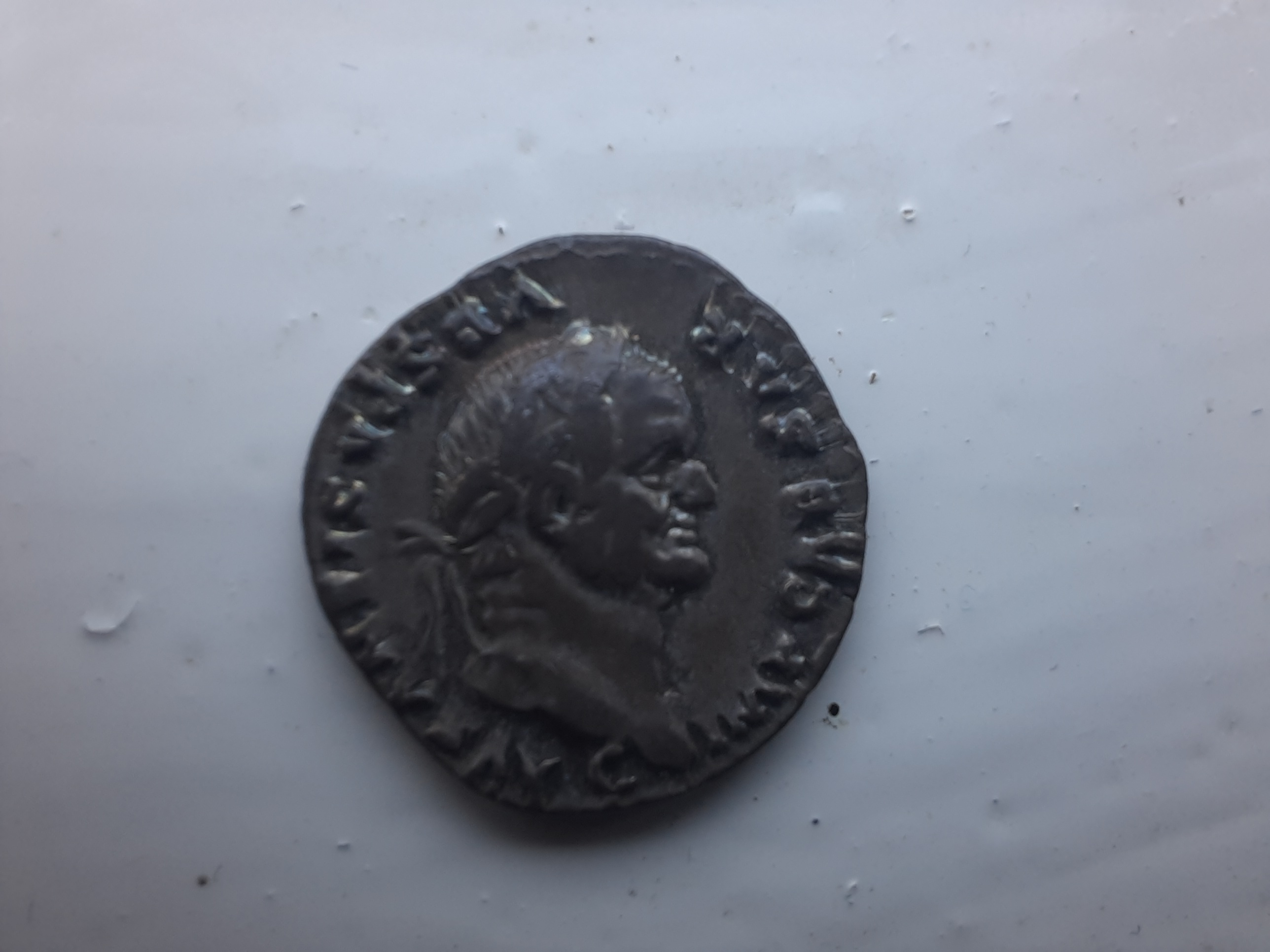 RIC II Trajan 772 Trajan obverse, Head of Roma, helmeted, right; star front