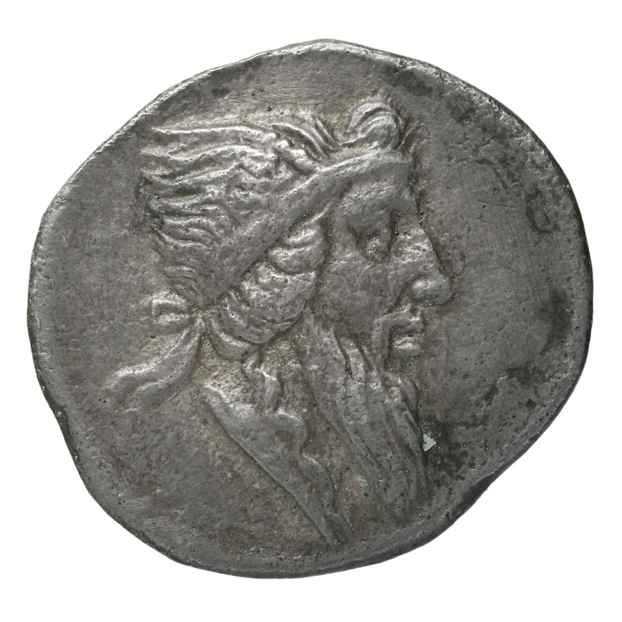 RIC II Trajan 776 Trajan obverse, Head of Mutinus Titinus, bearded, right?