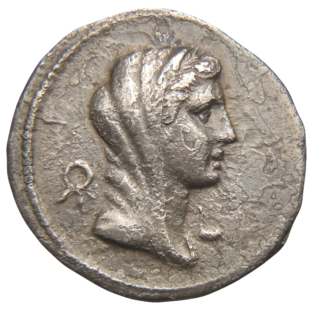 RIC II Trajan 790 Trajan obverse, Head of Vesta, veiled, right; flanked by wreath and simpulum