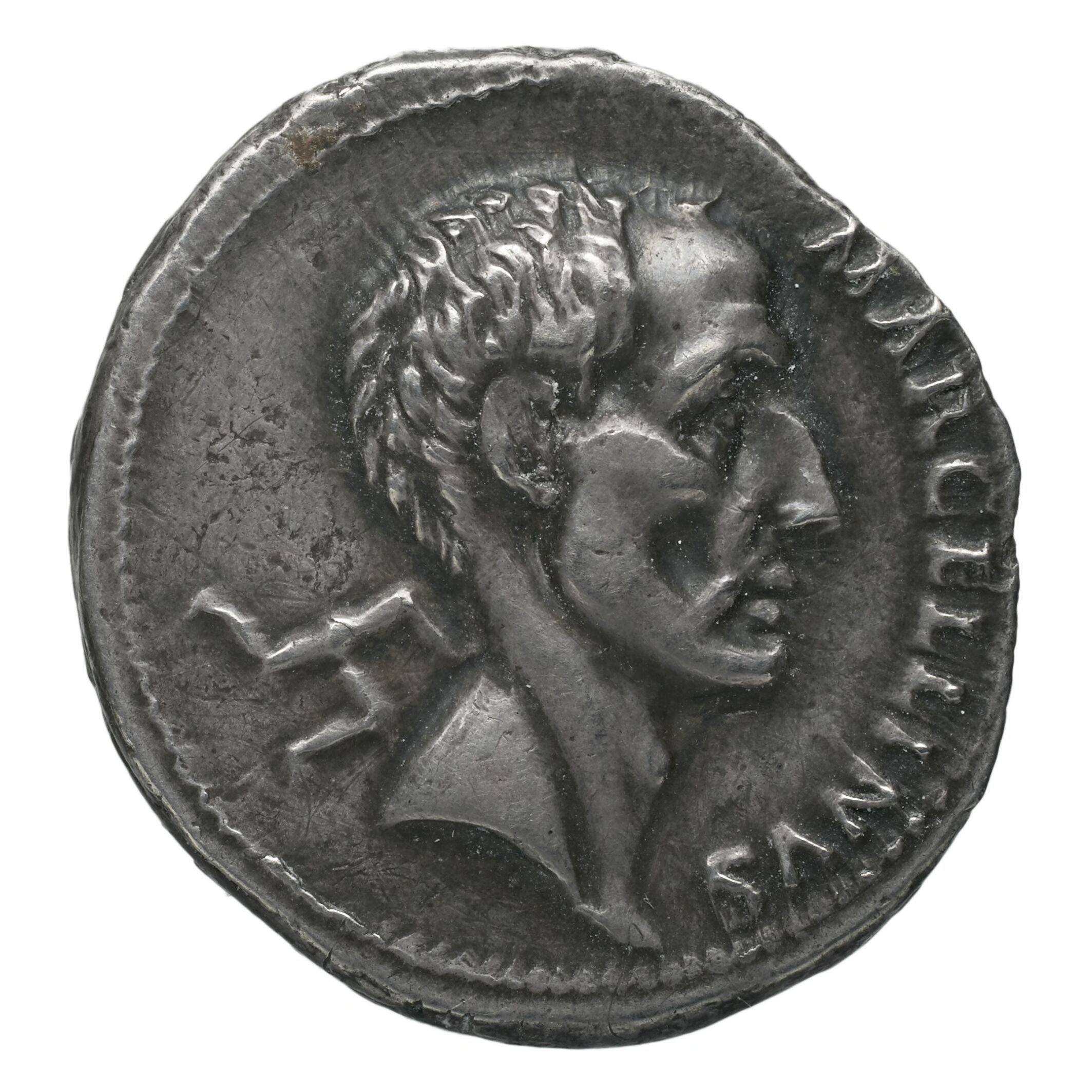 RIC II Trajan 809 Trajan obverse, Head of Marcus Claudius Marcellus, bare, right; triskelis behind