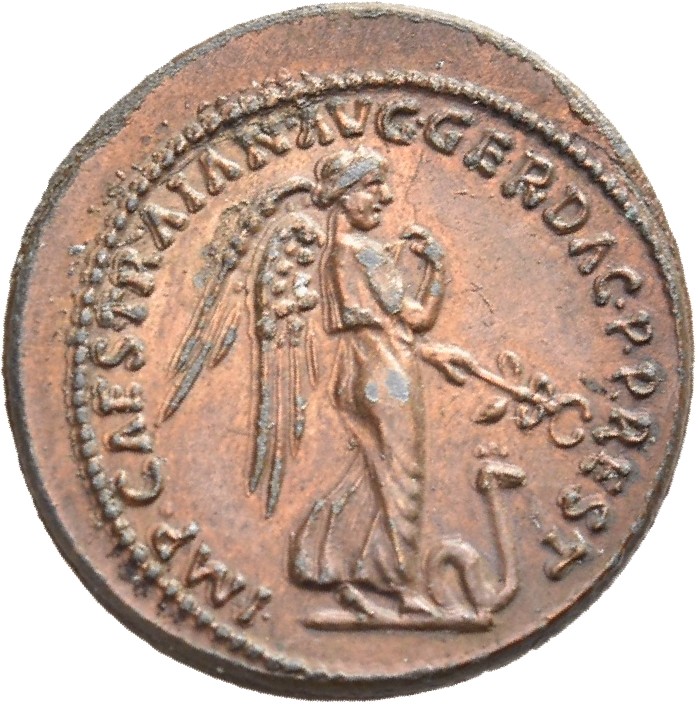 RIC II Trajan 815 Trajan reverse, Nemesis, winged, walking right, holding caduceus in left hand, and pulling drapery away ...