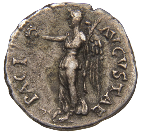 Vespasian reverse — Victory, draped, advancing left, holding wreath extended in right hand and palm over left shoulder in left