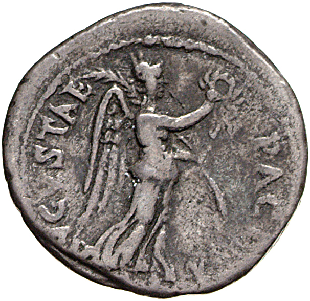 Vespasian reverse — Victory, draped, advancing right, holding wreath in extended right hand and palm over shoulder in left