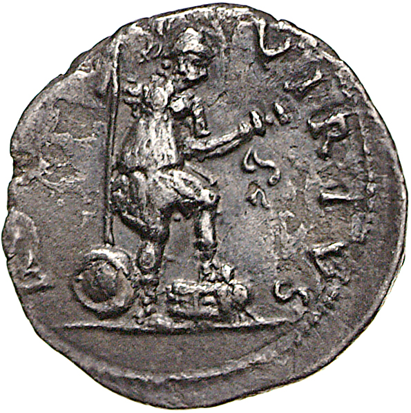 Vespasian reverse — Virtus standing right, resting left foot on prow, holding spear and parazonium
