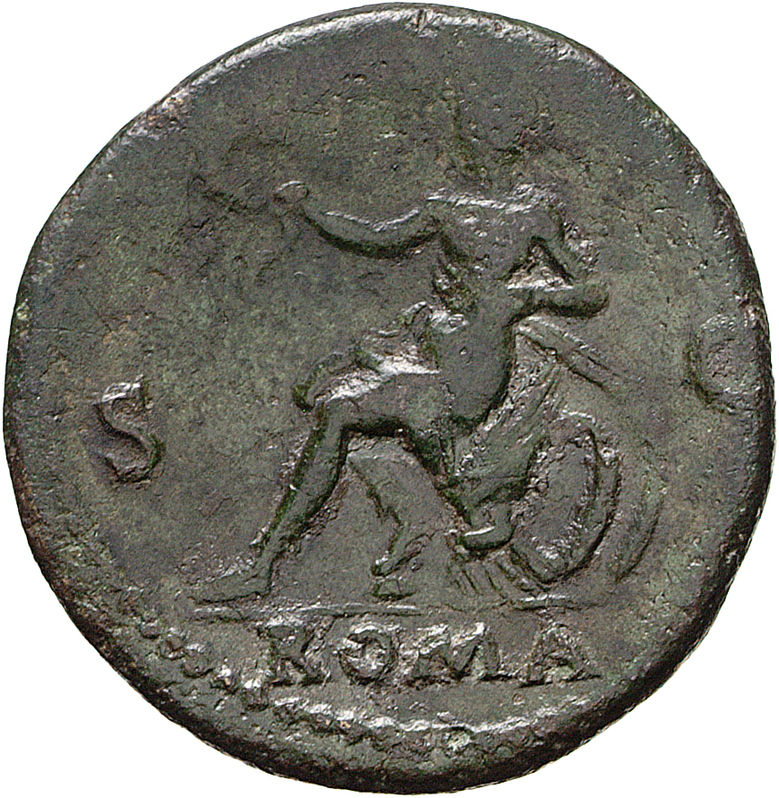 Vespasian reverse — Roma seated left on cuirass, holding wreath and parazonium; shields behind