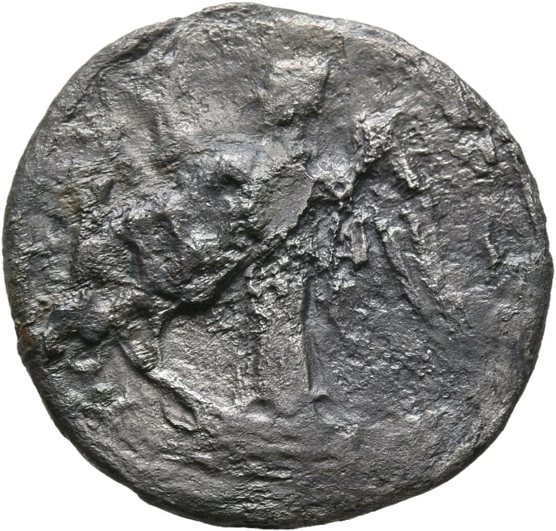 Vespasian reverse — Victory, draped, standing left on prow, holding wreath up in right hand and palm upright in left