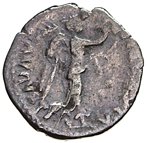 Vespasian reverse — Victory advancing right, holding wreath and palm