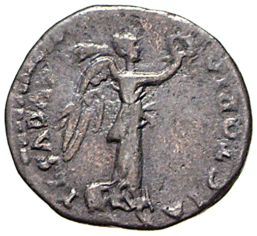 Vespasian reverse — Victory advancing right, holding wreath and palm