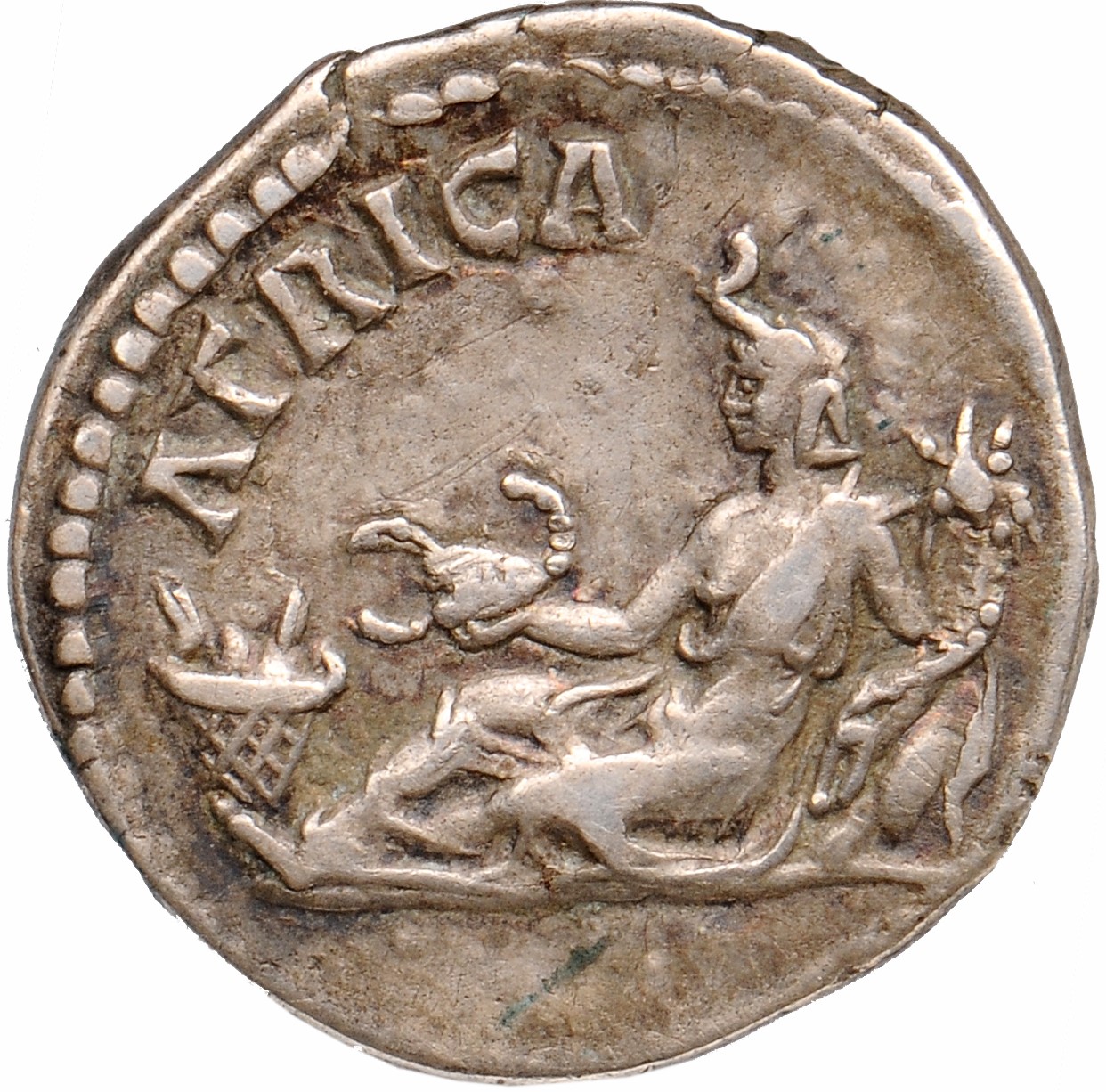 RIC II, Part 3 (second edition) Hadrian 1495 Hadrian reverse, Africa, wearing elephant scalp, reclining left, holding scor...