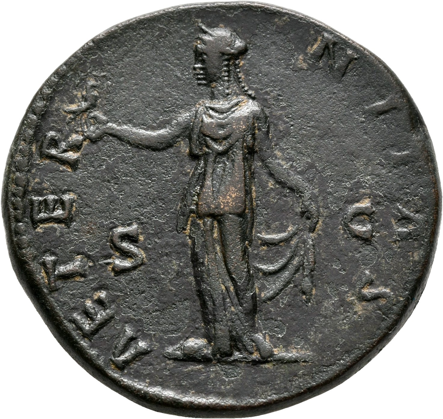 RIC III Antoninus Pius 1105b Antoninus Pius reverse, Aeternitas, draped, standing left, holding phoenix (nimbate right) on...