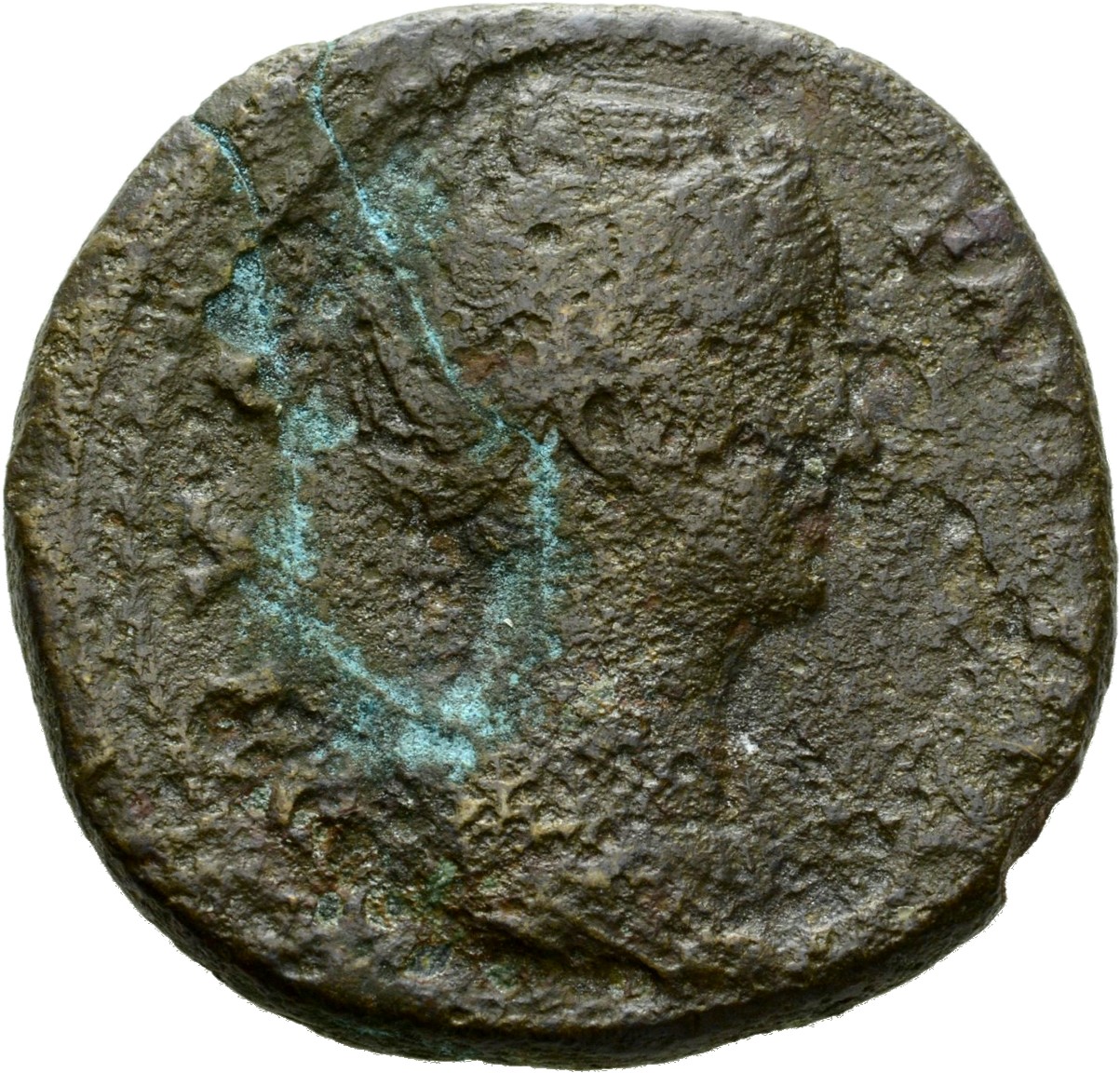 Antoninus Pius obverse — Bust of Faustina the Elder, draped, right, hair elaborately waved and coiled in bands across head and drawn up at back and piled in a round coil on top.