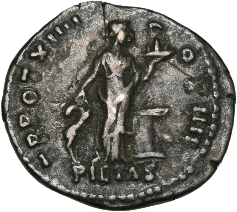 RIC III Antoninus Pius 201 Antoninus Pius reverse, Pietas, draped, standing front, head right, holding fore-legs of hind i...
