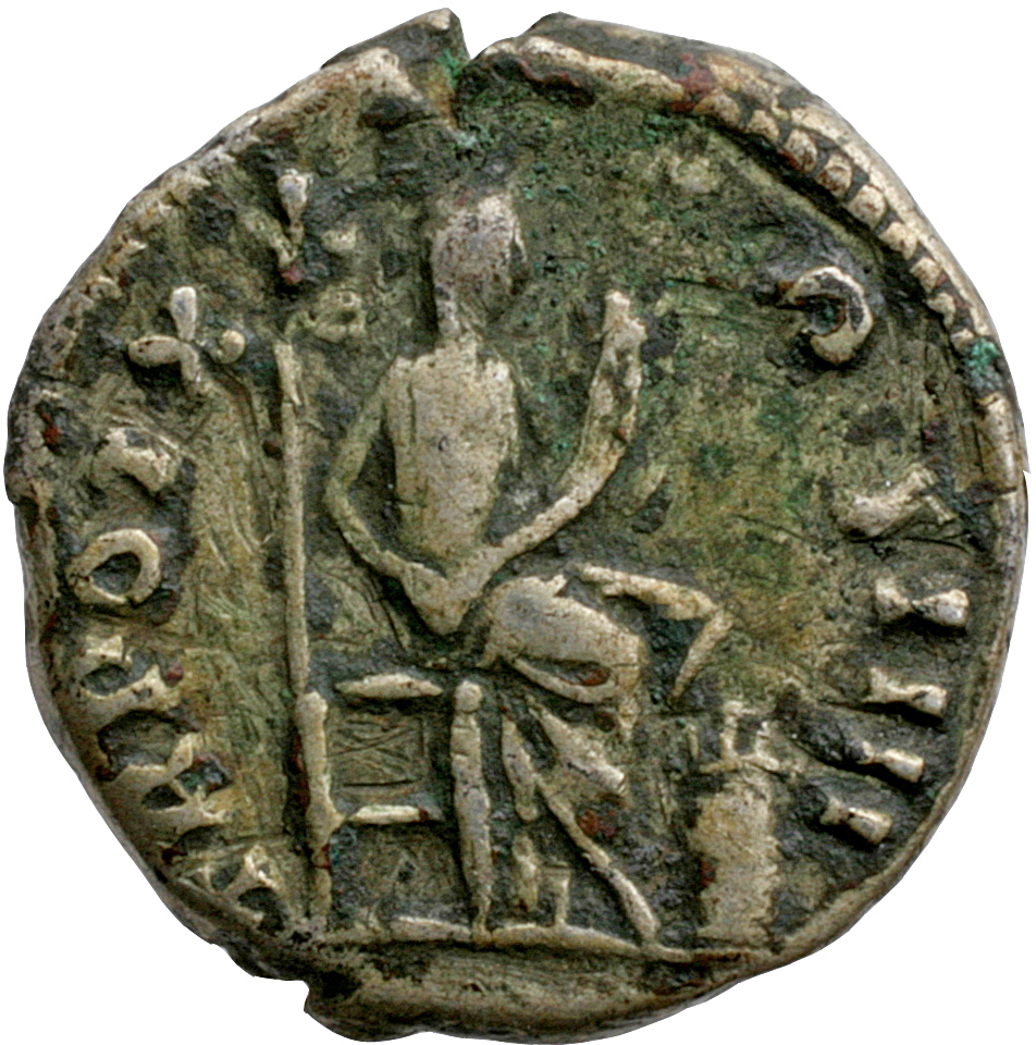 Antoninus Pius reverse — Annona, draped, seated right on throne, holding cornucopiae in both hands; at feet, modius and corn-ears