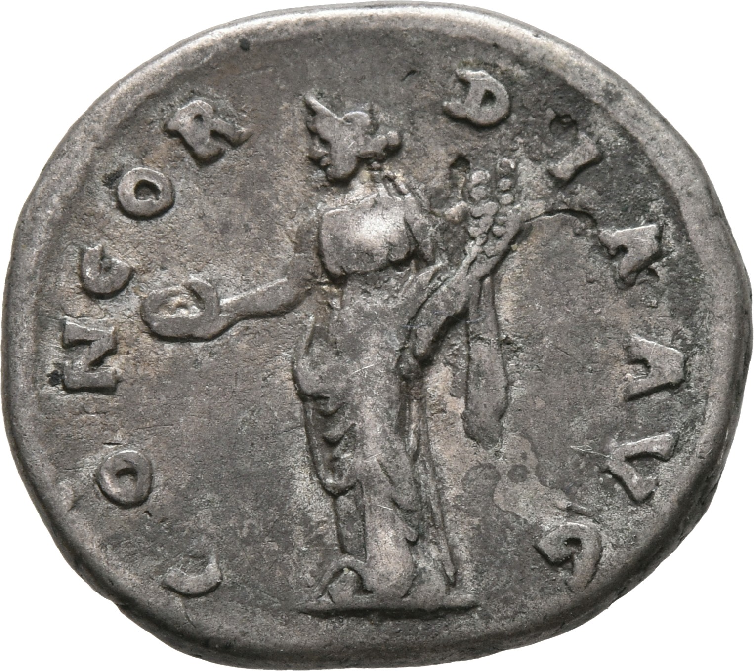 RIC III Antoninus Pius 335 Antoninus Pius reverse, Concordia, draped, standing left, head left, holding patera in extended...