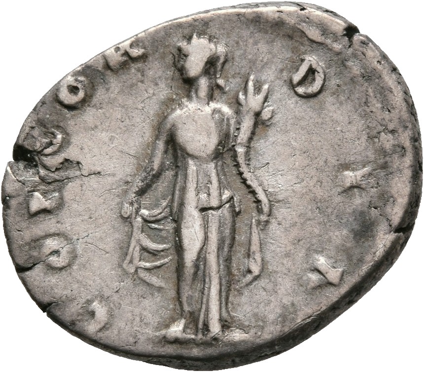 RIC III Antoninus Pius 501 Antoninus Pius reverse, Concordia, draped, standing front, head left, raising skirt and holding...