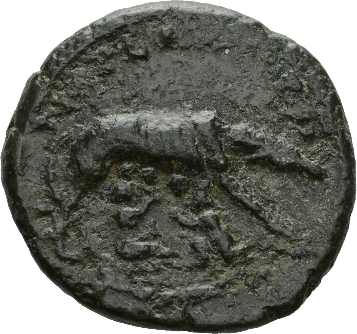 RIC III Antoninus Pius 734A Antoninus Pius reverse, She-wolf, suckling twins, standing, right, (with head sometimes turned...