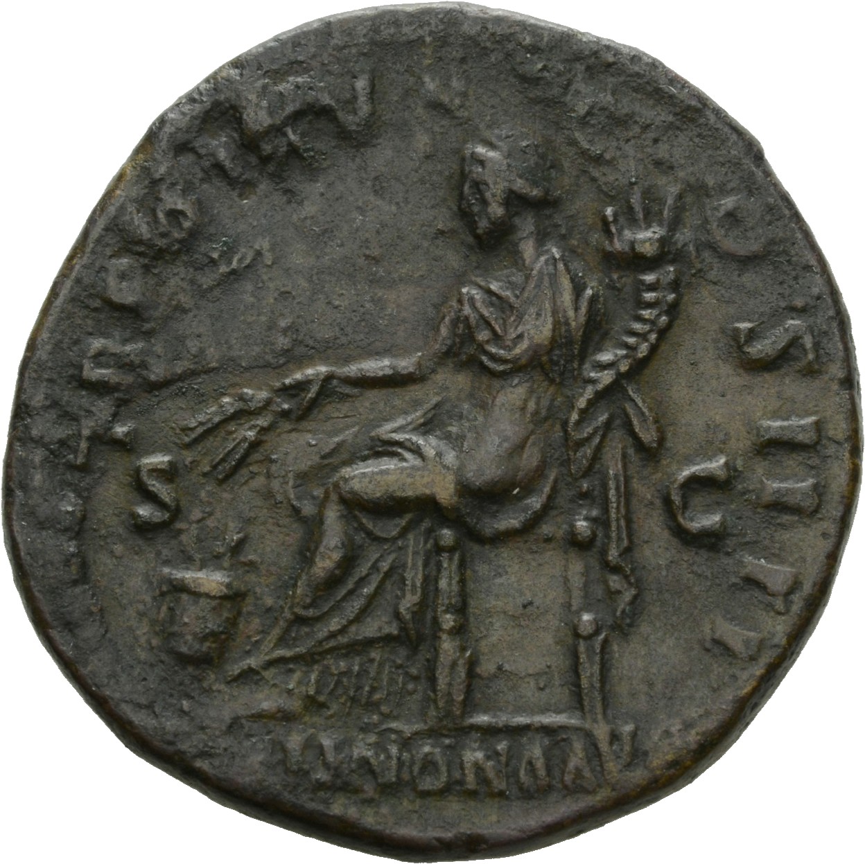 Antoninus Pius reverse — Annona, draped, seated, left on low seat, holding two corn-ears in extended right hand over modius with corn-ears and cornucopiae in left
