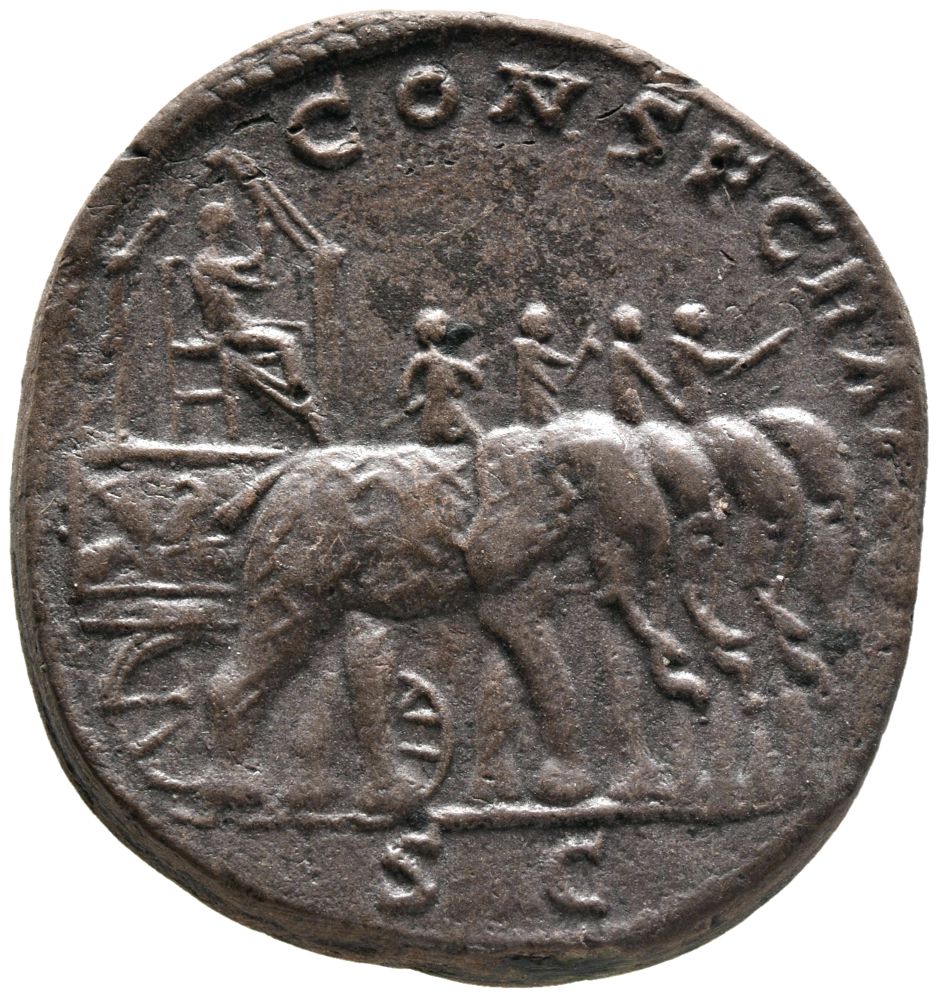 RIC III Commodus 661 Commodus reverse, Figure of Marucs Aurelius, holding Victory in extended right hand and seated right ...