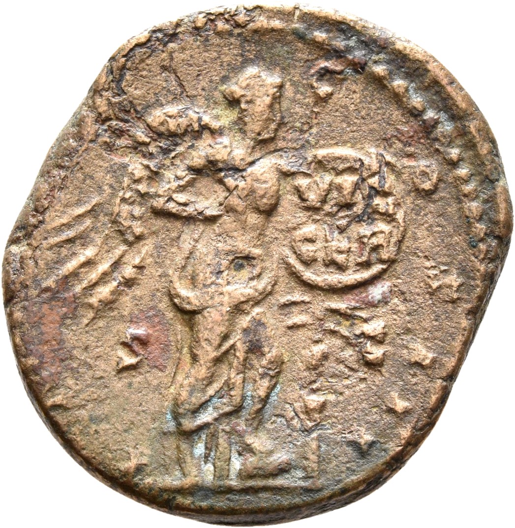 RIC III Marcus Aurelius 1031 Marcus Aurelius reverse — Victory, winged, naked to waist, standing right, placing with left ...