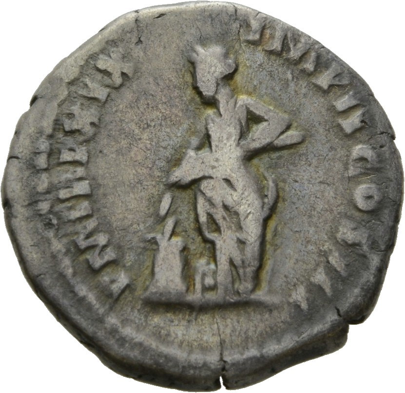 Marcus Aurelius reverse — Annona, draped, standing left, emptying with both hands a cornucopiae into modius, left: her right foot is set on globe