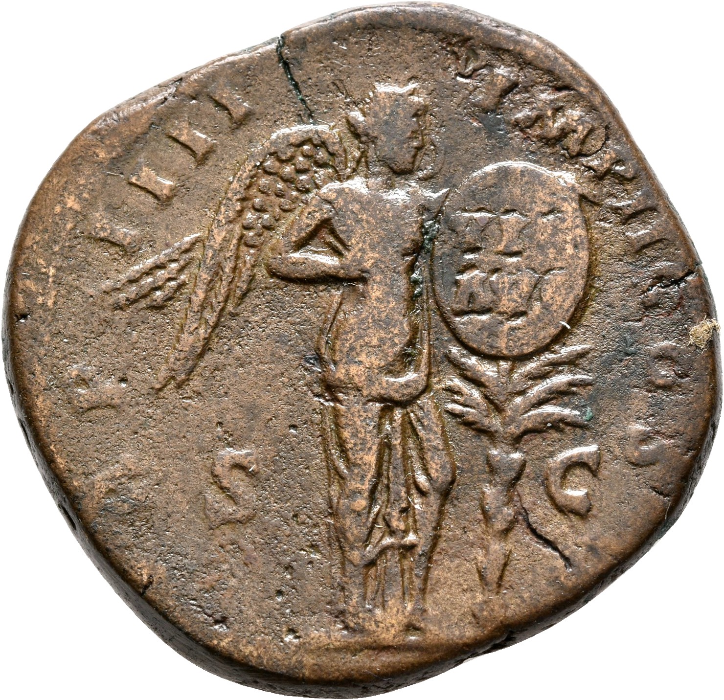 RIC III Marcus Aurelius 1397 Marcus Aurelius reverse, Victory, winged, half-draped, standing right, fixing to a palm-tree ...