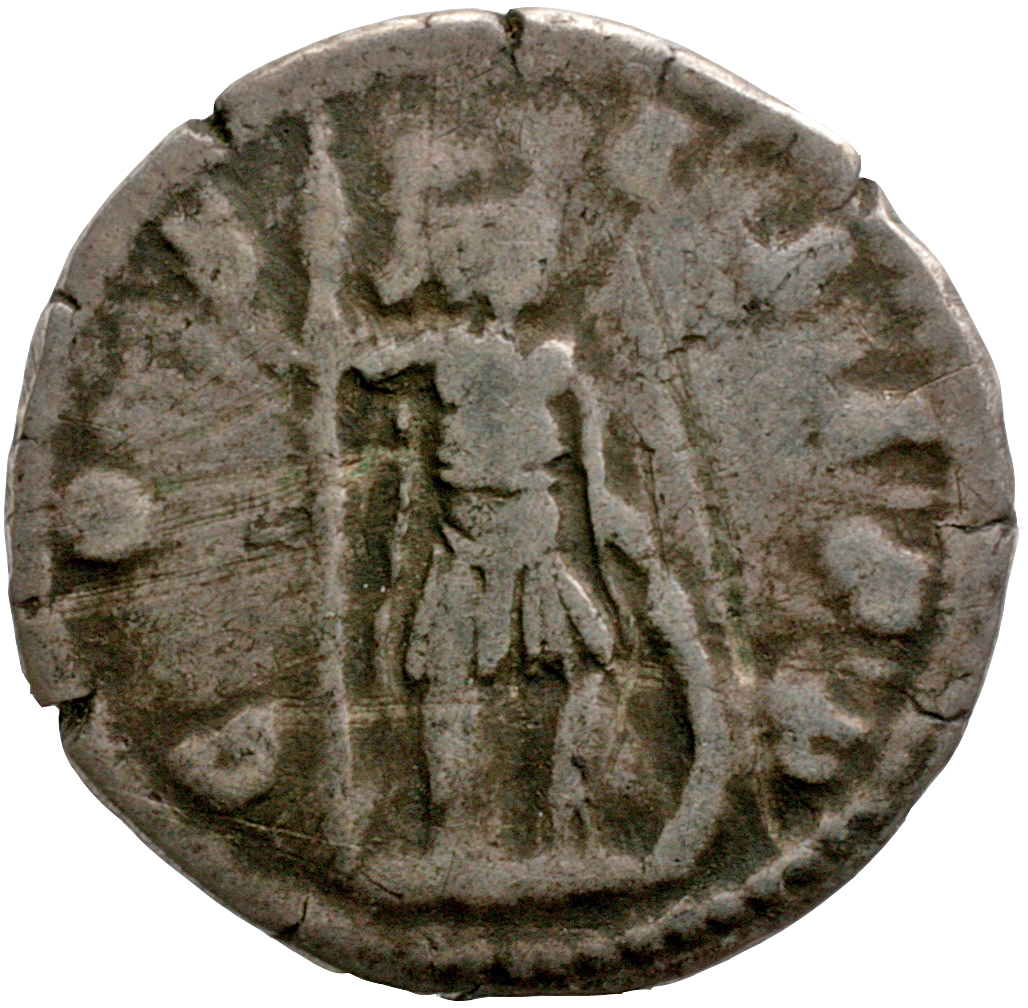 Marcus Aurelius reverse — Mars, helmeted, in military dress, standing right, holding vertical spear, inverted, in right hand and resting left hand on round shield set on ground