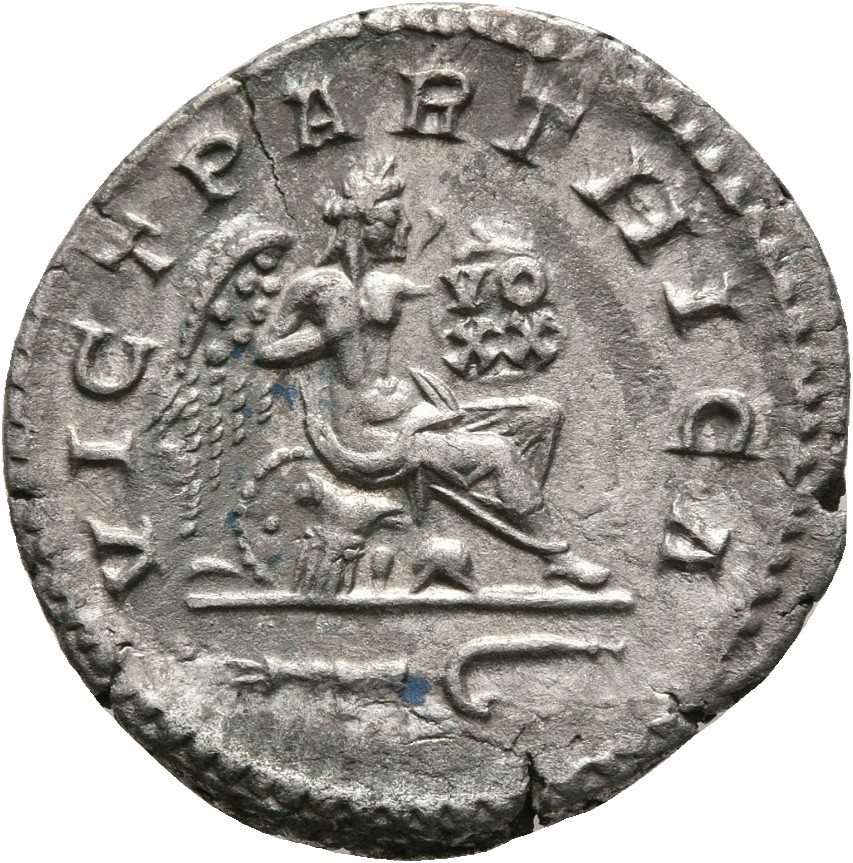 RIC IV Caracalla 314A Caracalla reverse, Victory, winged, draped, seated right on cuirass, holding shield inscribed VO XX;...