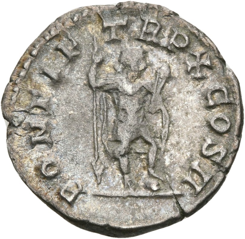 RIC IV Caracalla 95 Caracalla reverse, Caracalla, in military attire, standing right, left foot on helmet, holding spear i...