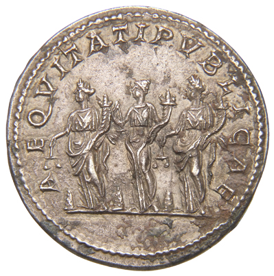Septimius Severus reverse — The three Monetae, all draped, standing left, each holding scales in right hand and cornucopiae in left hand; at their feet, heaps of metal