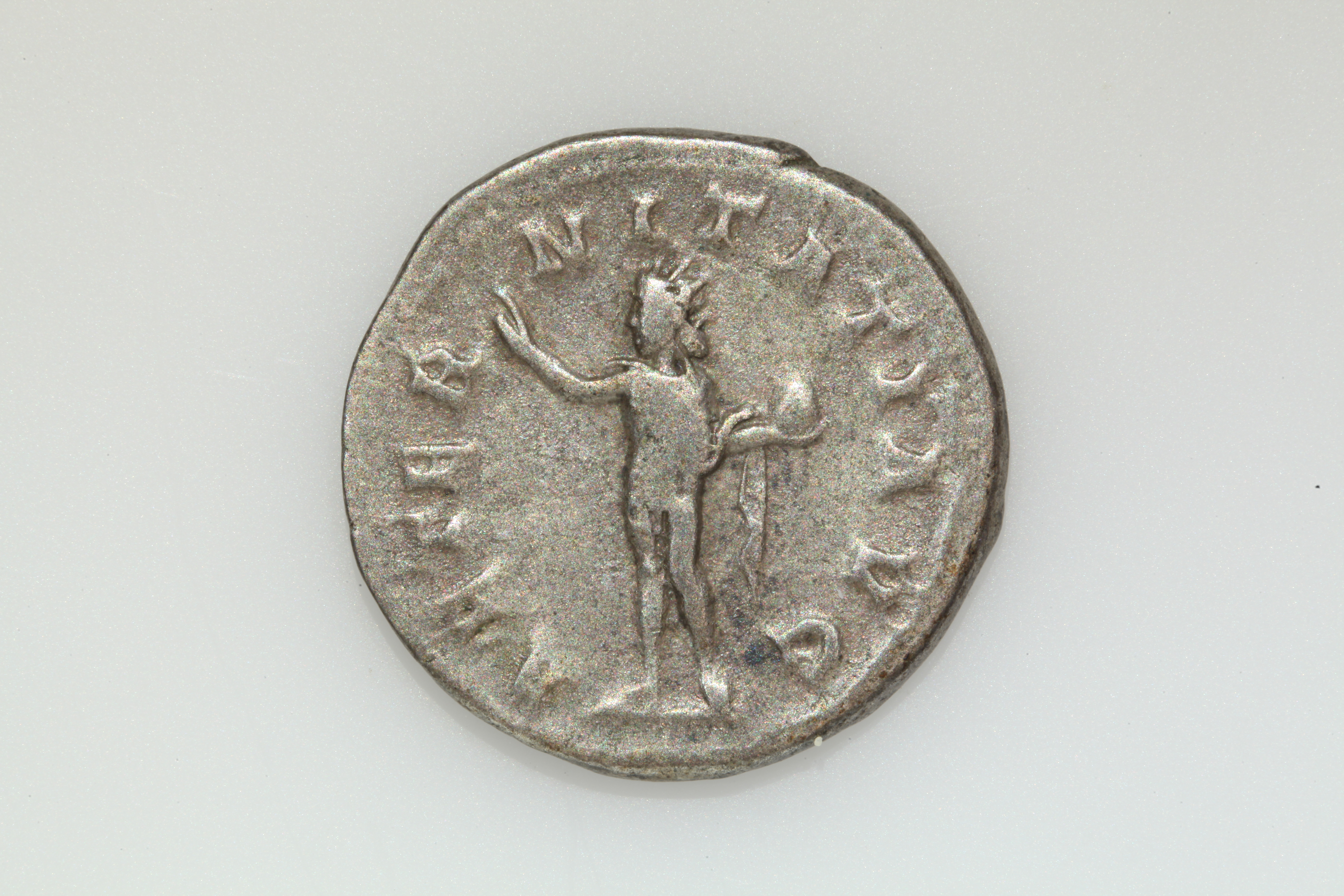RIC IV Gordian III 83 Gordian III reverse, Sol, nude except for cloak around shoulders, standing front, head left, raising...